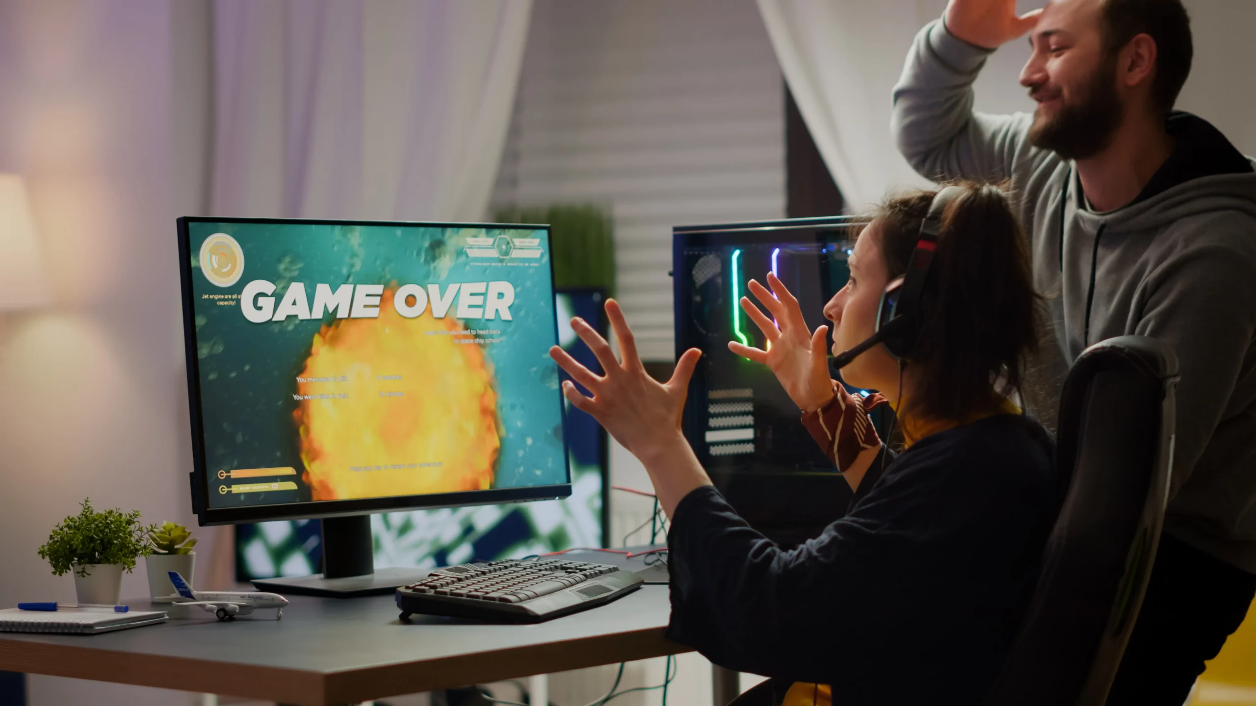 Gamer reacting to defeat in action game by Shooter Game Development Agency in UK