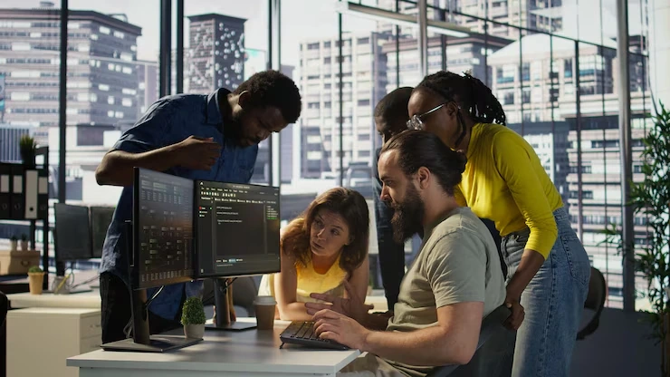 Unity Game Development Agency in UK team collaborating on code
