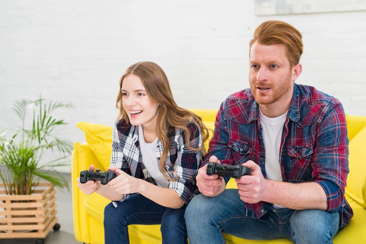 Couple enjoying a console game created by a Custom Game Development Agency in UK