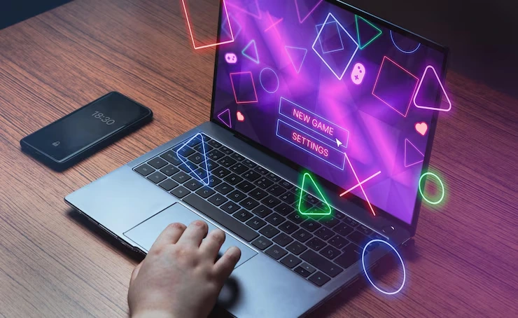 Multiplayer Game Development Agency in UK showcasing futuristic game menu on laptop
