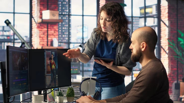 Multiplayer Game Development Agency in UK discussing character design on screen
