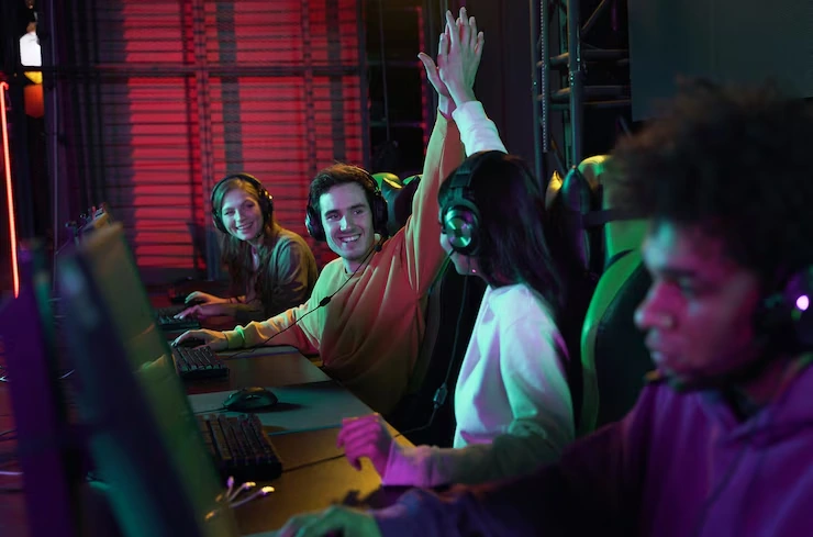 Unity Game Development Agency in UK team celebrating multiplayer level success